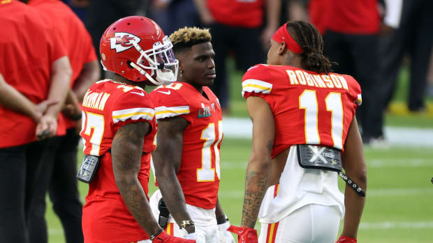 Feb 2, 2020; Miami Gardens, Florida, USA; Kansas City Chiefs wide receiver Mecole Hardman (17), Chiefs wide receiver Tyreek Hill (10) and Chiefs wide receiver Demarcus Robinson (11) talk on the field prior to the Super Bowl LIV against the San Francisco 49ers at Hard Rock Stadium. Mandatory Credit: Geoff Burke-USA TODAY Sports